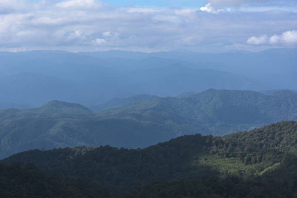istock Dark fog and cloud mountain valley spring landscape. 636565870