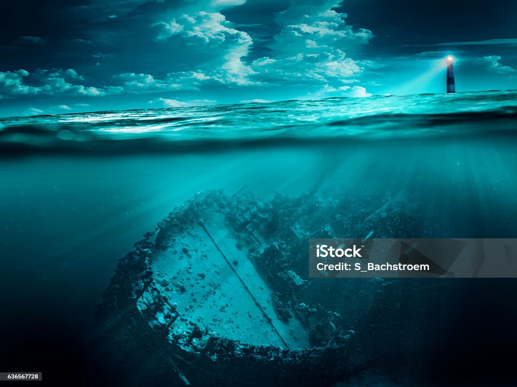 Shipwreck is illuminated by the lighthouse Ship Stock Photo