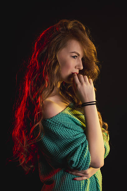 istock Tender model wearing knitted sweater. Studio shot 636572234