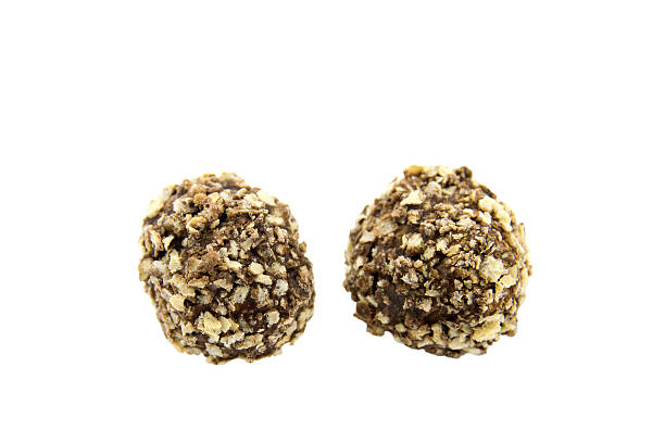 istock Chocolate candies isolated on white background. 636572842