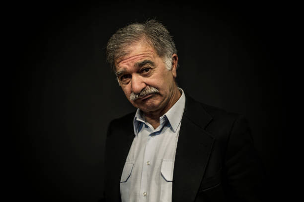 istock Senior Turkish Man Portrait on Black Background 636579794