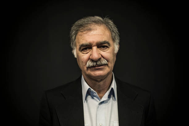 istock Senior Turkish Man Portrait on Black Background 636579824