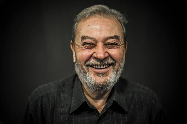 istock Senior Man Portrait on Black Background 636581664