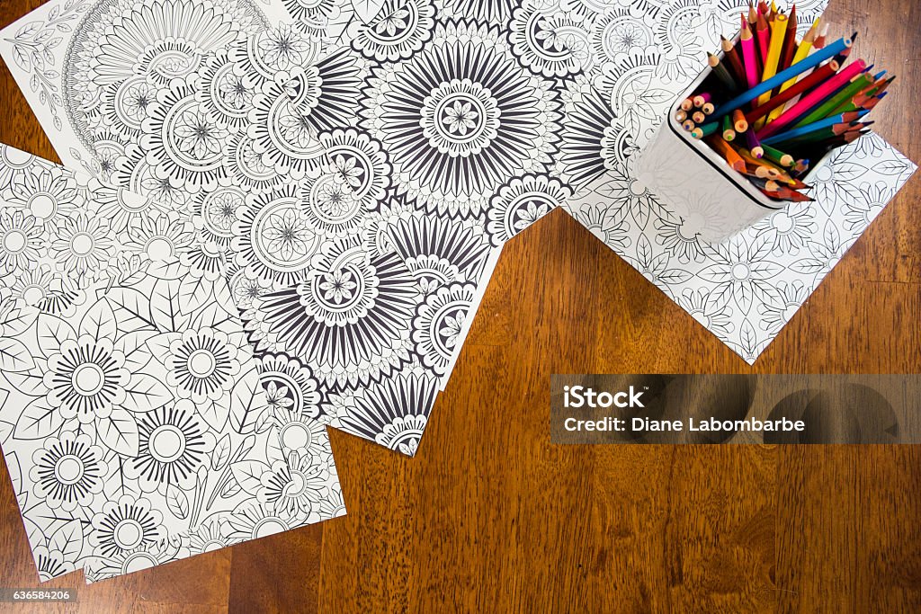 Many Adult Coloring Book Designs With Pencil Crayons Stock Photo