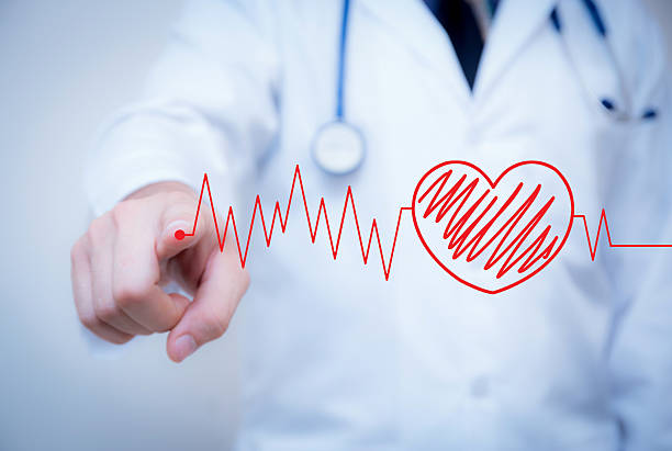 istock finger write red heart with the heart 636584316