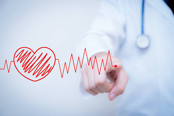 istock finger write red heart with the heart 636584406