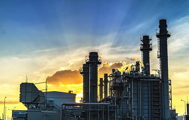 istock Gas turbine electrical power plant with twilight. 636585364