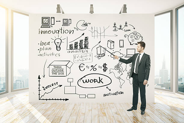 istock Man delivering presentation on business 636587410