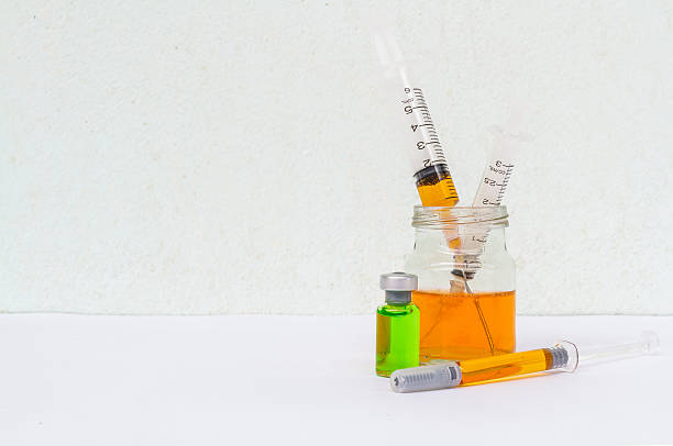 istock Syringe and drug 636587804