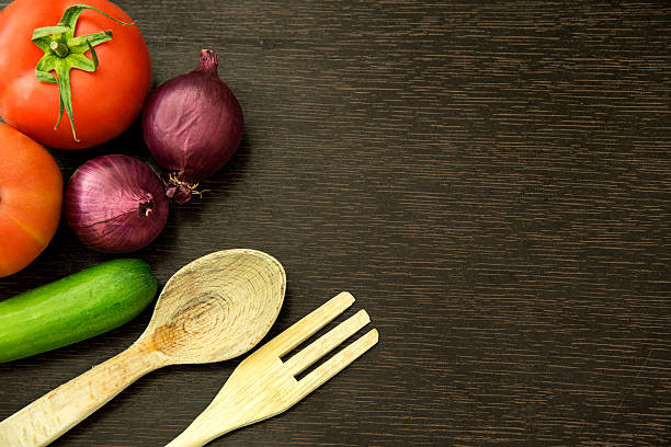 Vegetables With Wooden Spoon On Wooden Background.