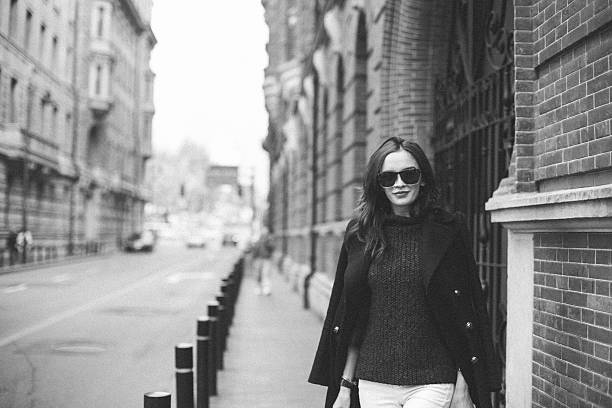istock Beautiful lady on the sidewalk 636589812