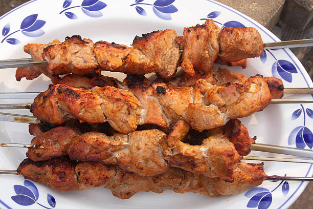 istock Grilled meat on skewers. 636592096