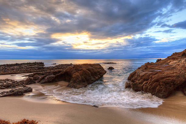 istock Sunset over the rocks at Pearl Street Beach 636594686