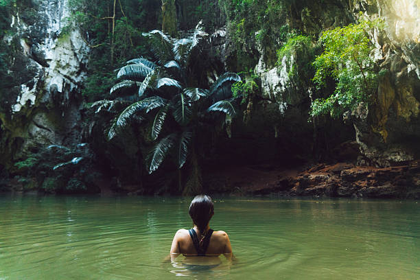 istock Woman swimming in lagoon 636595744