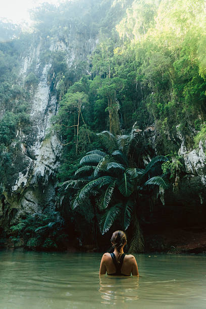 istock Woman swimming in lagoon 636595750