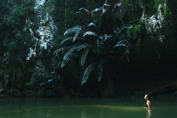 istock Woman swimming in lagoon 636596012
