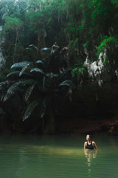 istock Woman swimming in lagoon 636596960