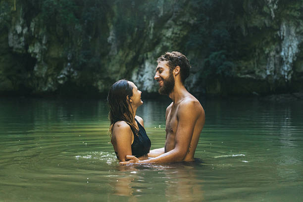istock Couple  swimming in lagoon 636597010