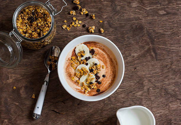 Pumpkin smoothie bowl with banana and granola