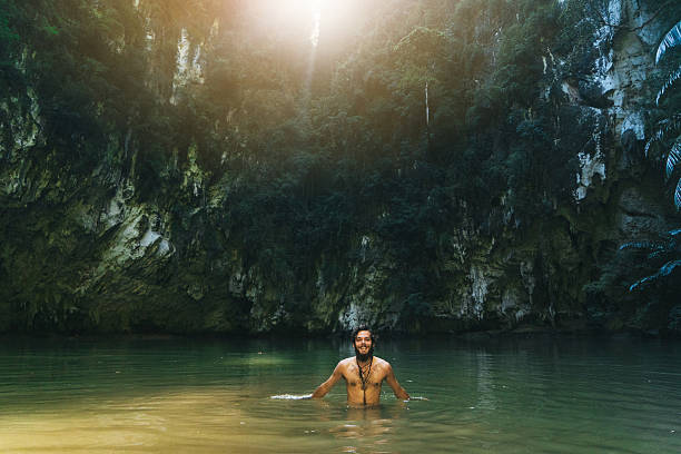 istock Man in lagoon in the jungles 636597792