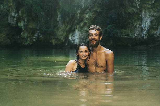 istock Couple swimming in lagoon 636597806
