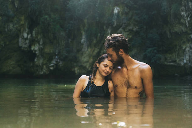istock Couple swimming in lagoon 636597808