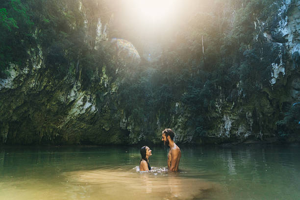 istock Couple swimming in lagoon 636597814