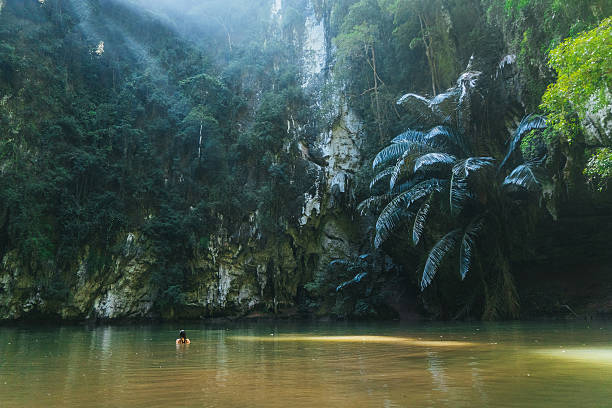 Young Caucasain woman swimming in lagoon in Thailand