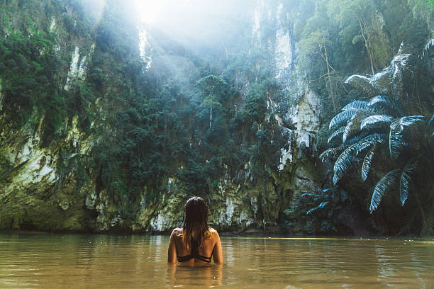 istock Woman swimming in lagoon 636597890