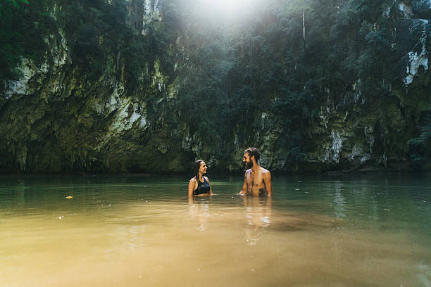 istock Couple swimming in lagoon 636597896