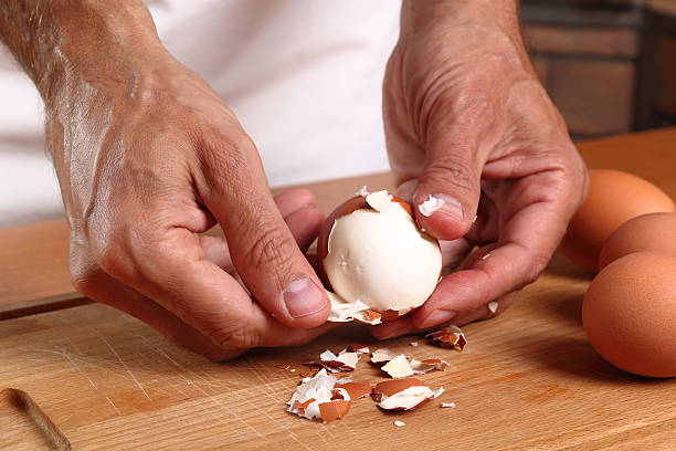 ghisa duro uova sode - hard cooked egg foto e immagini stock