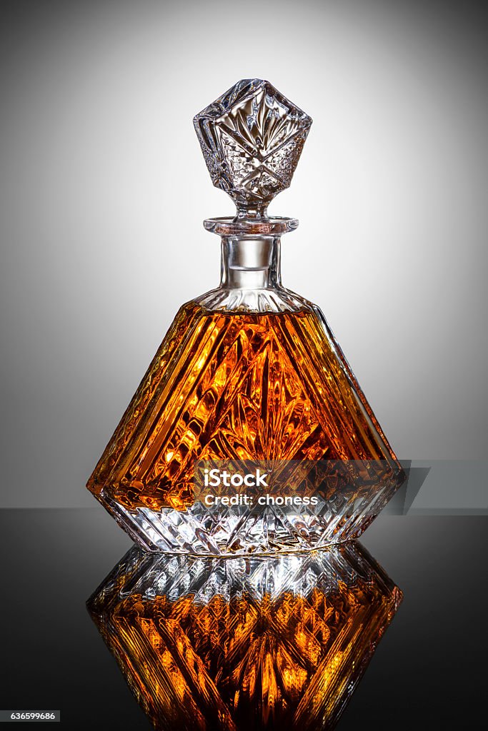 Carafe Carafe of brandy on dark background Crystal Glassware Stock Photo