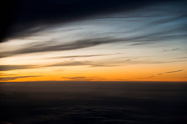 istock Aerial cloudscape at sunset 636599750