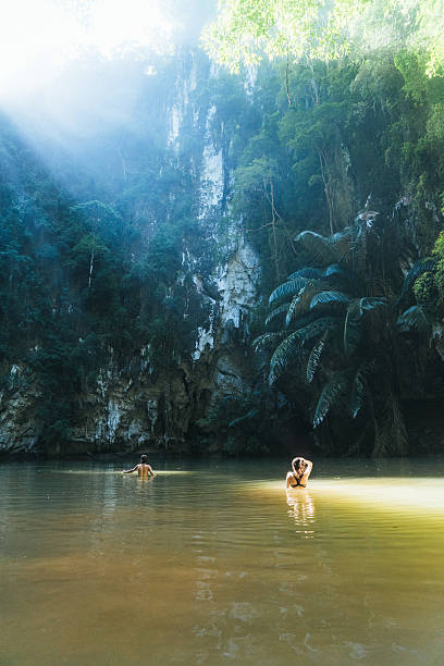 istock Couple  swimming in lagoon 636599830