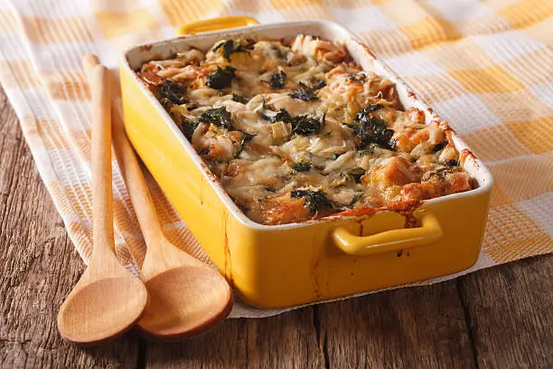 Photo of Strata casserole with spinach close up. Horizontal