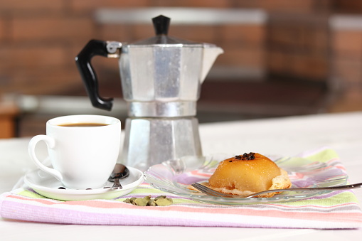 Pear Tarte Tatin with Cardamom, Moka Pot and Coffee Cup