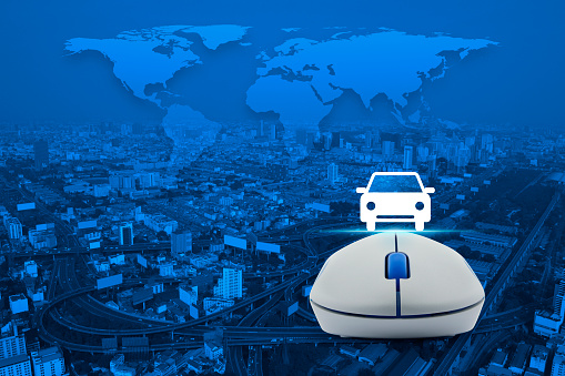 Wireless computer mouse with car front view flat icon over city tower, street and expressway, Internet service car concept, Elements of this image furnished by NASA