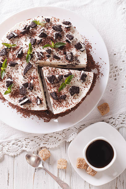 istock Cheesecake dessert with chocolate and coffee on a table close-up 636603118