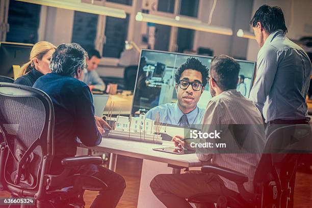 Group Of Architects Having A Video Conference Stock Photo - Download Image Now - Video Conference, Architect, Business