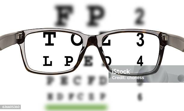 Eyeglasses With Eyesight Test Stock Photo - Download Image Now - Defocused, Eyeglasses, Medical Exam