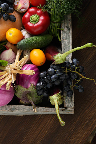 istock Fresh veggies in wood crate 636608530