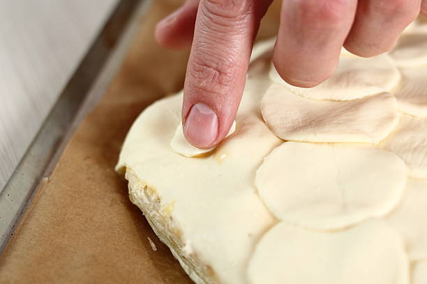 istock Add smaller round of puff pastry for eye 636611026