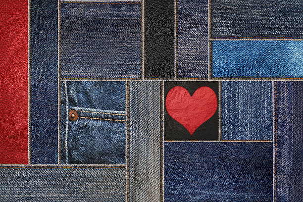 patchwork jeans mit ledertextur und herzform - leather patch denim jeans stock-fotos und bilder