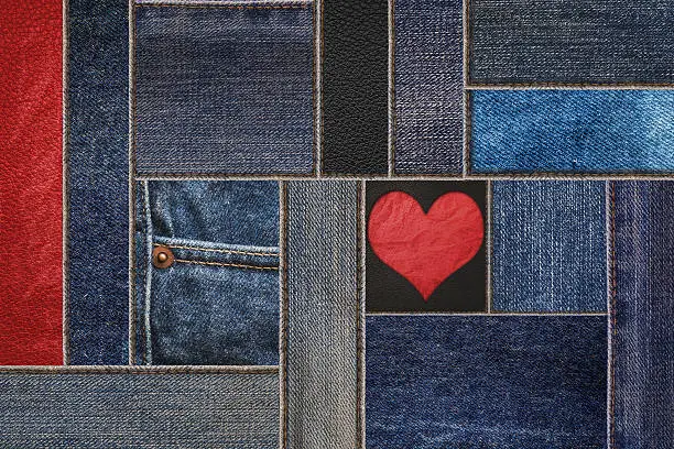 Photo of Patchwork denim jean with leather texture, and heart shape