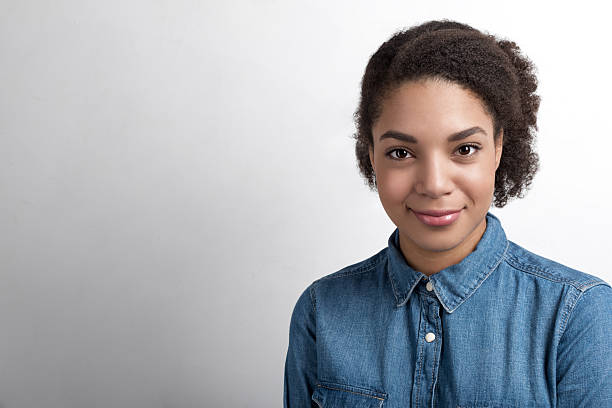 istock Young smiling woman wearing denim clothes, looking at camera 636618072