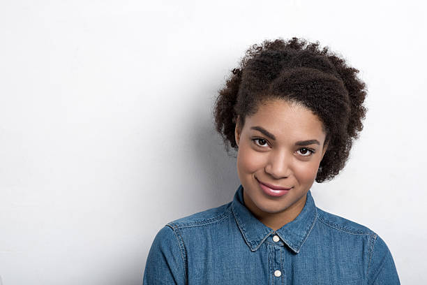 istock Young woman wearing denim clothes, looking at camera 636618122