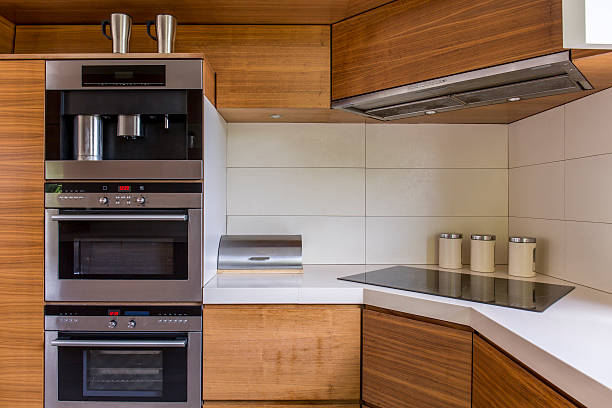 istock Modern kitchenette with wooden furniture 636620140