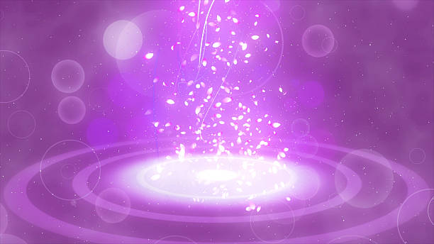 istock Mysterious shining particles and petals of cherry blossom 636620470