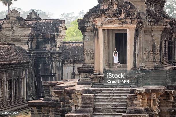 Yoga Retreat Woman Meditating Angkor Wat Cambodia Stock Photo - Download Image Now
