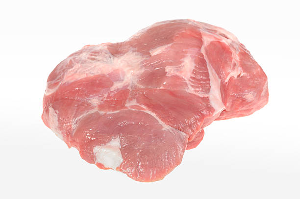istock Fresh crude pork neck meat steak isolated on white background 636623402